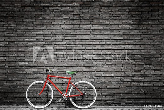 Picture of Black and white photo of red bicycle - vintage film grain filter effect styles